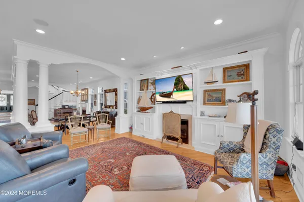 a living room with furniture and a rug