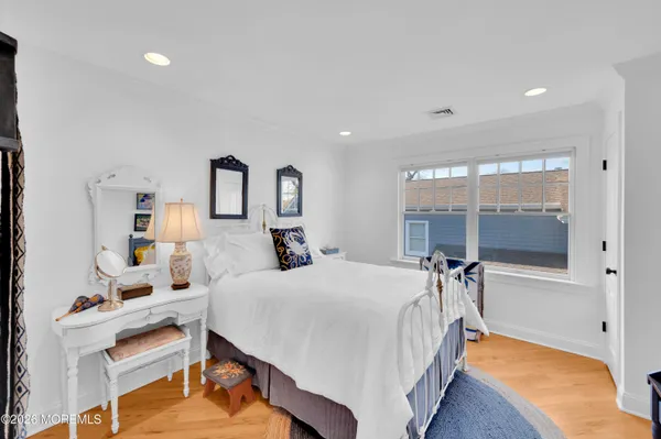 an aerial view of a house with a yard and garden