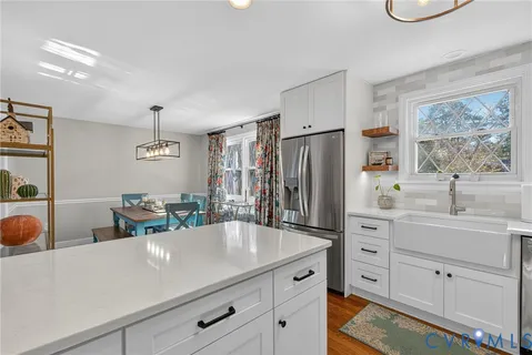 a view of a bedroom with washer and dryer