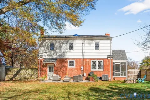 a view of a patio with couches and potted plants
