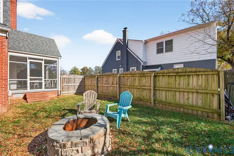 a view of swimming pool with seating space