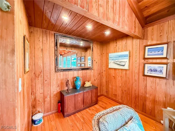 a bed room with a bed and a walk in closet