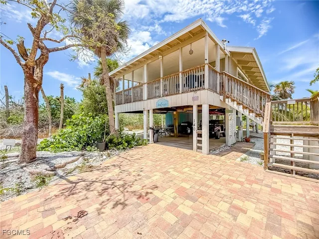 a view of a building with sitting area