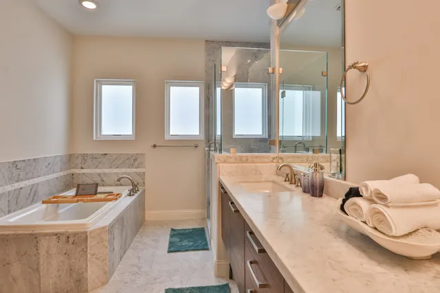 a bathroom with a sink and a bathtub