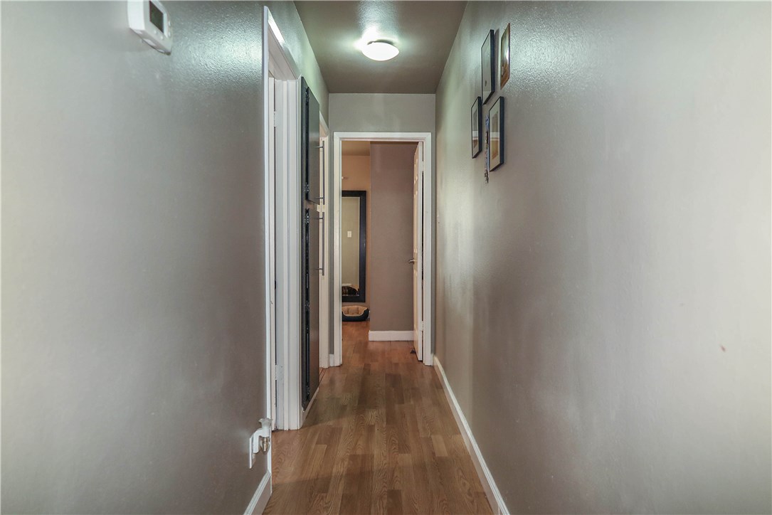3905 Chase Circle, Unit B Austin, TX 78721 - Photo 13 of 18 a view of hallway with wooden floor