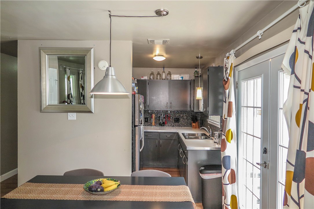 3905 Chase Circle, Unit B Austin, TX 78721 - Photo 8 of 18 a bathroom with a sink a toilet and shower