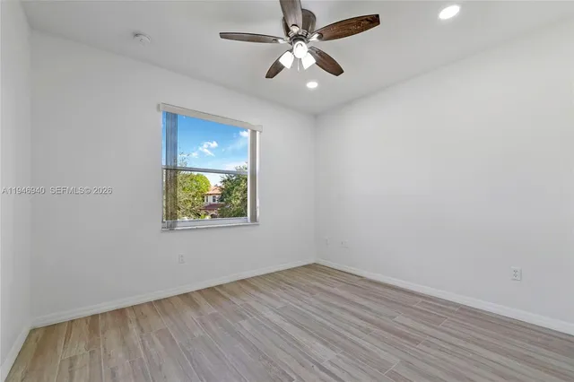 front view of a house with a garden