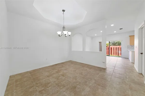 a view of a livingroom with a staircase