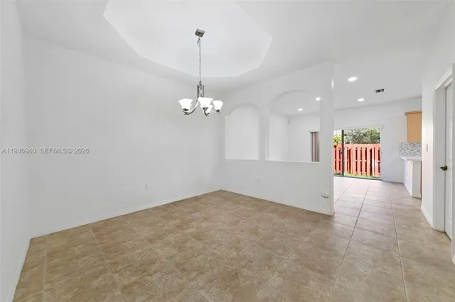 a view of a livingroom with a staircase