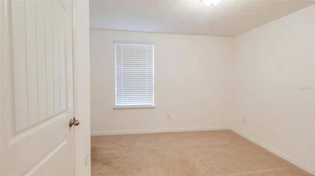 a view of kitchen with windows