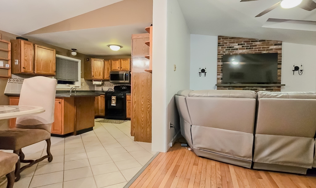 7 Roosevelt Street Wareham, MA 02571 - Photo 11 of 28 a living room with furniture and a flat screen tv