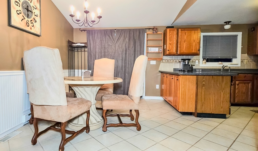 7 Roosevelt Street Wareham, MA 02571 - Photo 12 of 28 a view of kitchen with breakfast area