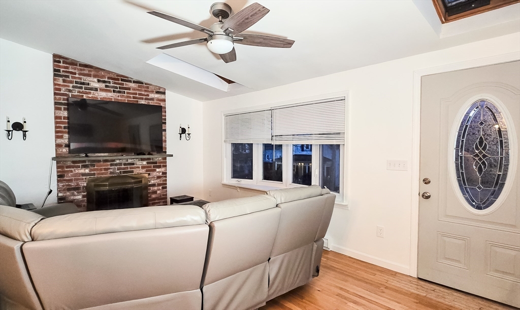 7 Roosevelt Street Wareham, MA 02571 - Photo 16 of 28 a living room with furniture and a flat screen tv