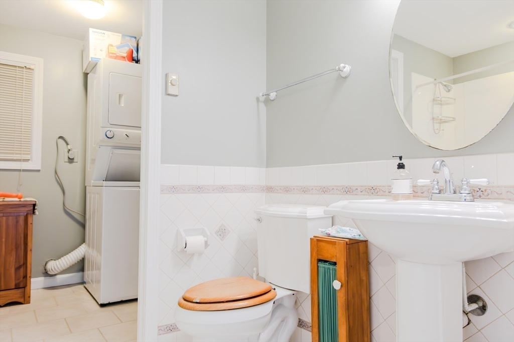 7 Roosevelt Street Wareham, MA 02571 - Photo 23 of 28 a bathroom with a sink toilet and shower