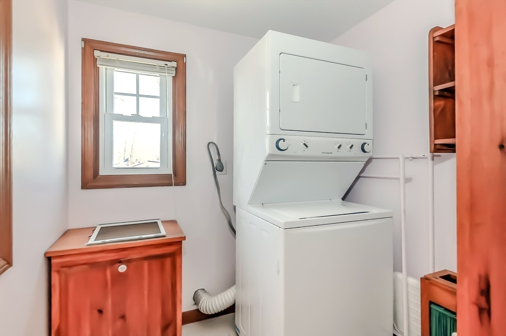 7 Roosevelt Street Wareham, MA 02571 - Photo 26 of 28 a utility room with closet dryer and washer