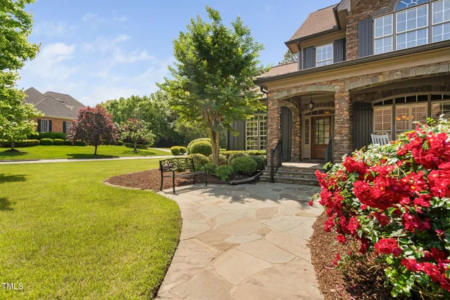 a view of a house with a garden