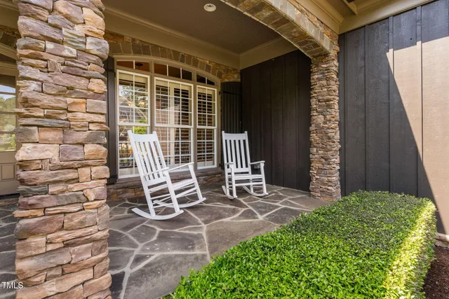 an aerial view of a house with outdoor space