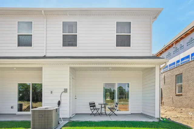 a house view with a garden space
