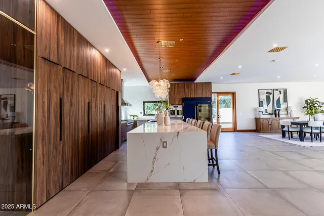 a kitchen with a stove and a sink