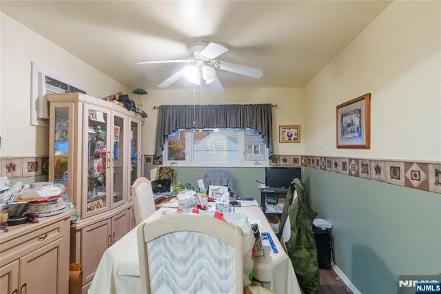 a bedroom with furniture and a chandelier