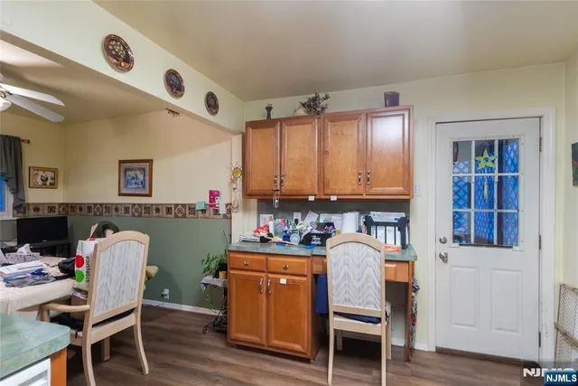 a workspace with furniture and wooden floor
