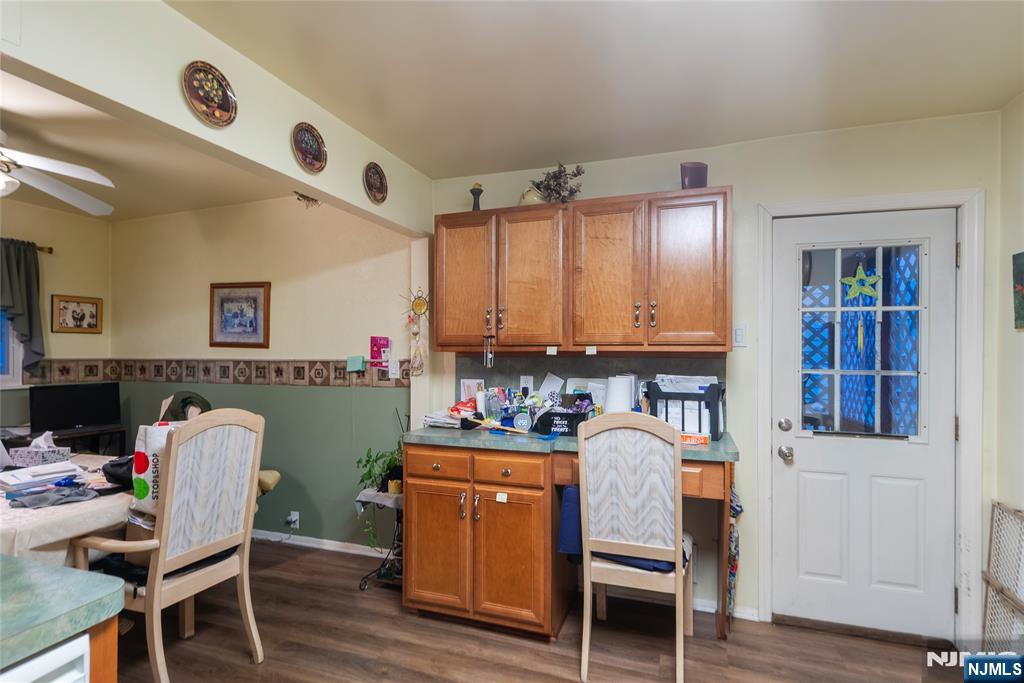 205 North 15th Street Bloomfield, NJ 07003 - Photo 27 of 30 a workspace with furniture and wooden floor