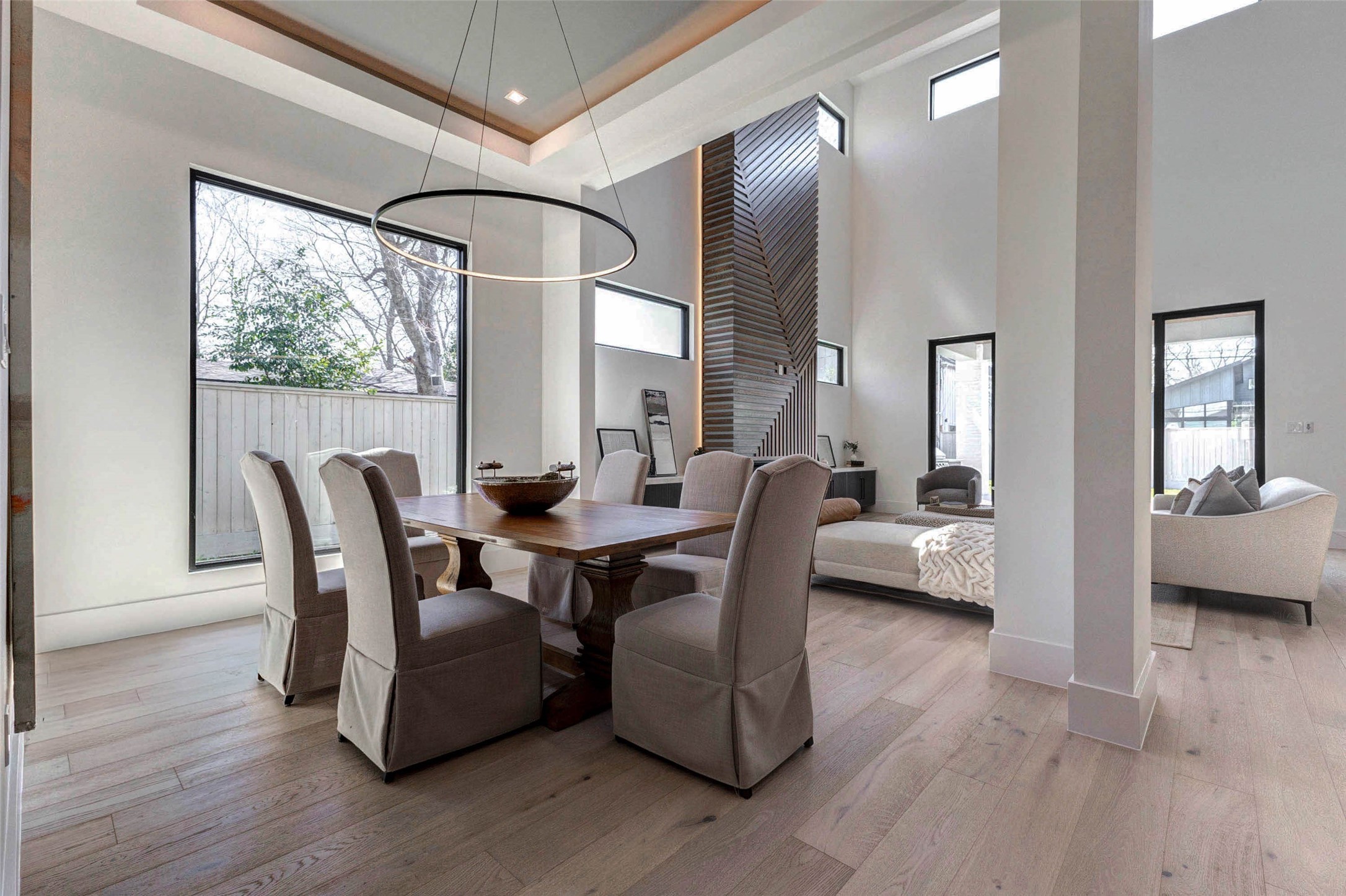 207 West 33rd Street Houston, TX 77018 - Photo 8 of 50 Elegant formal dining room perfect for hosting dinner parties, highlighted by designer lighting and refined finishes.