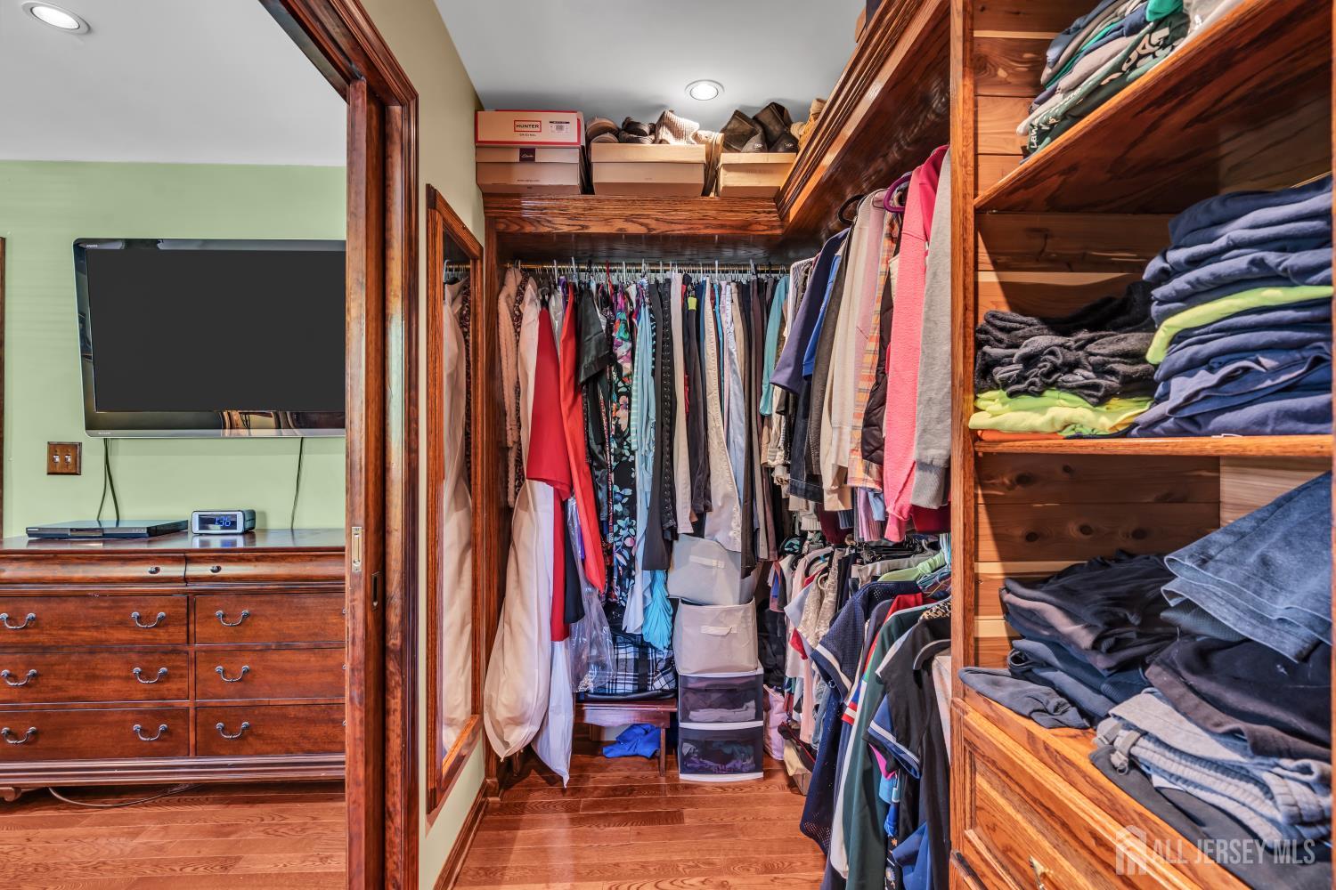 99 Schulmeister Road Old Bridge, NJ 08857 - Photo 25 of 49 a view of walk in closet with clothes