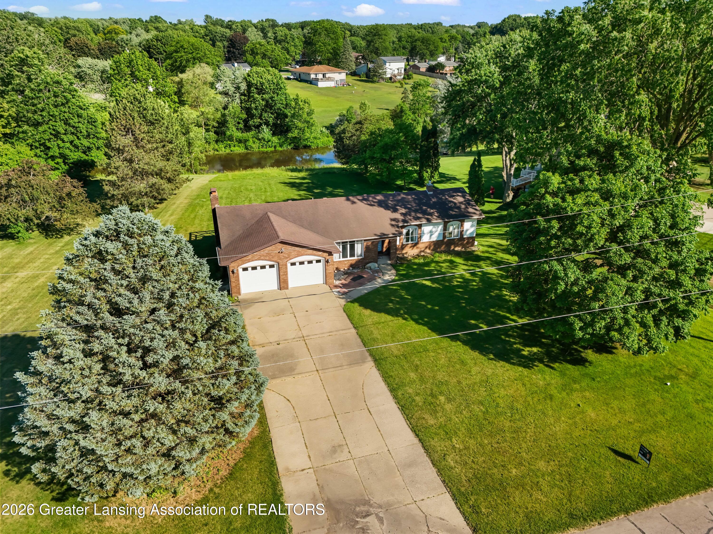 6822 Aberdeen Drive Dimondale, MI 48821 - Photo 15 of 47 DJI_20260612181127_0945_D