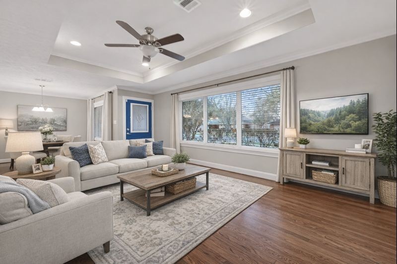 5323 Briarbend Drive Houston, TX 77096 - Photo 3 of 38 a living room with furniture and a flat screen tv