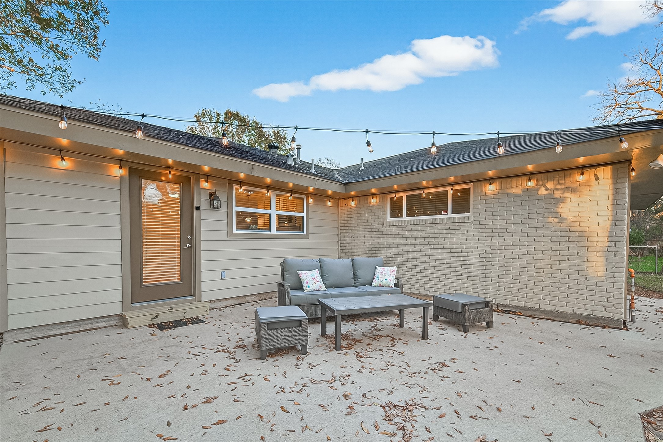 5323 Briarbend Drive Houston, TX 77096 - Photo 32 of 38 a outdoor living space with patio furniture and a potted plant