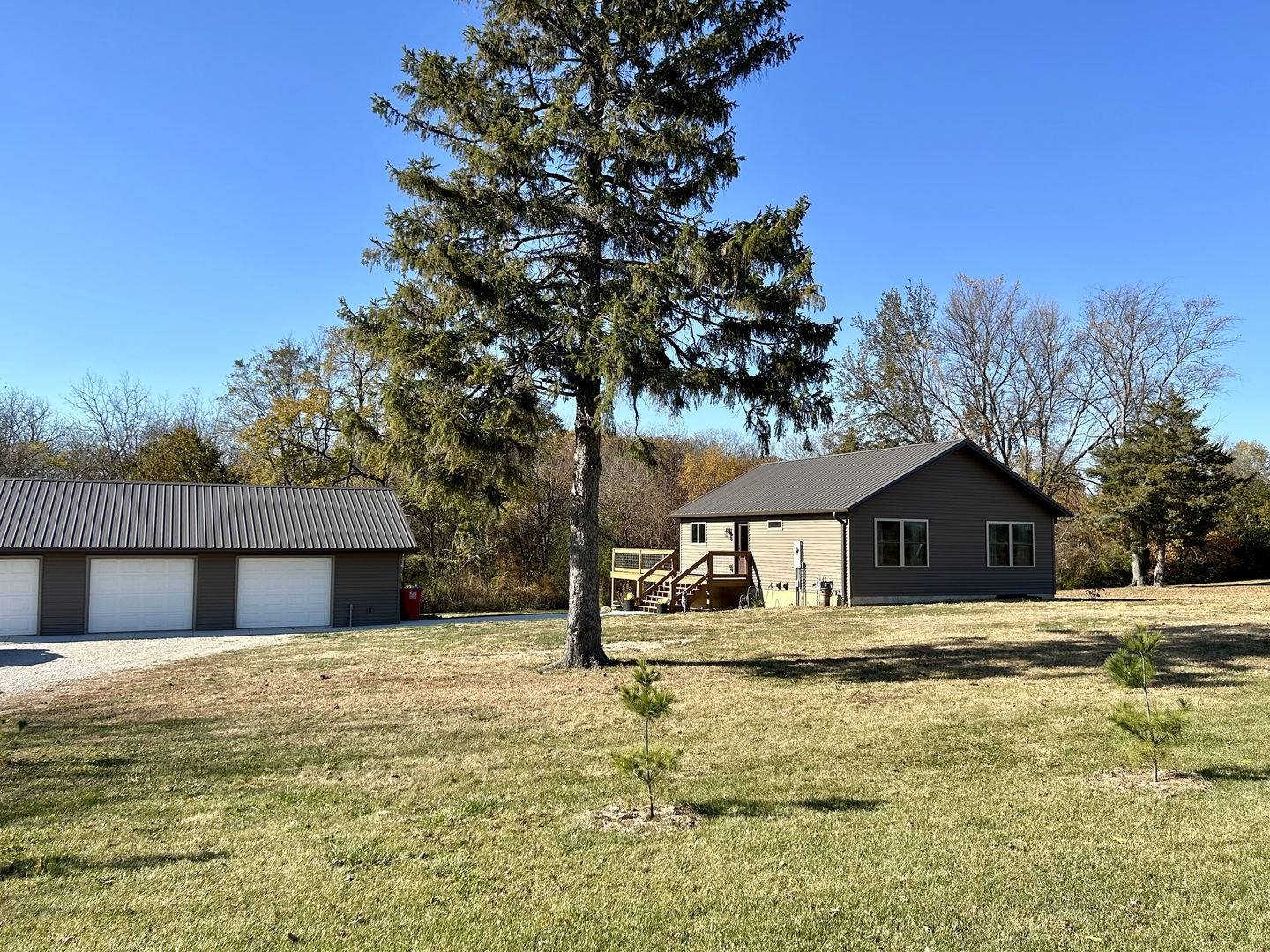 2345 East 275th Road Oglesby, IL 61348 - Photo 18 of 20 a front view of a house with a yard