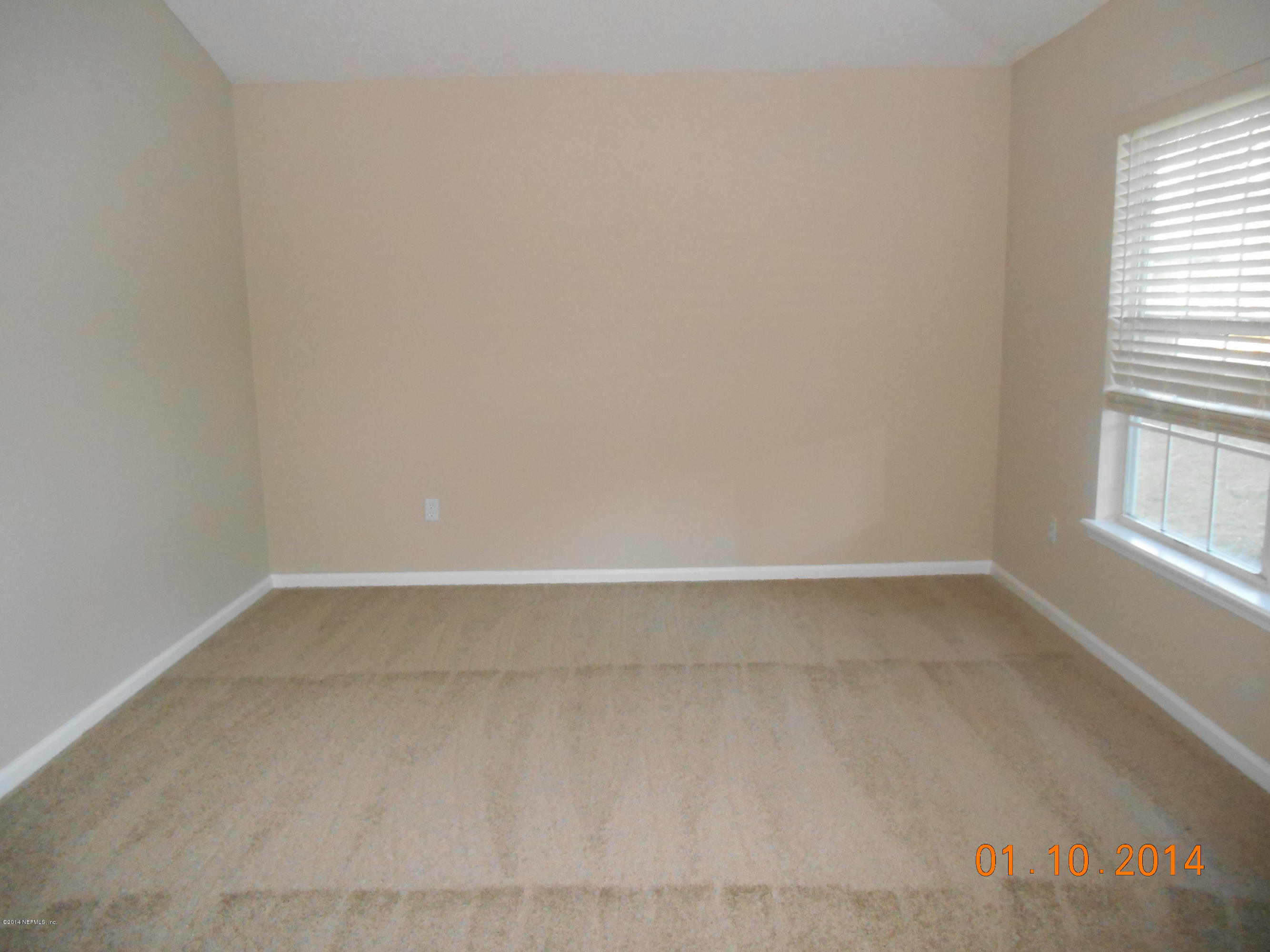 97226 Castle Ridge Drive Yulee, FL 32097 - Photo 3 of 15 a view of a small space with a window