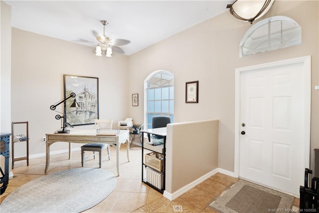 3532 Southwest Margela Street Port St. Lucie, FL 34953 - Photo 6 of 29 a view of a livingroom with furniture and a window