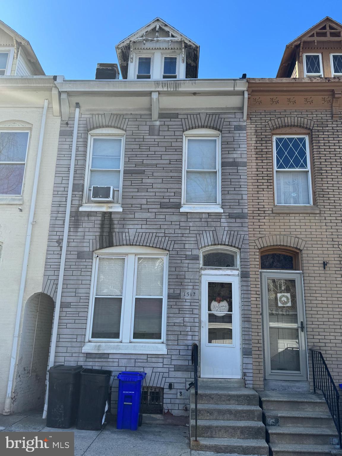 1512 Haak Street Reading, PA 19602 - Photo 2 of 10 a front view of a house with many windows
