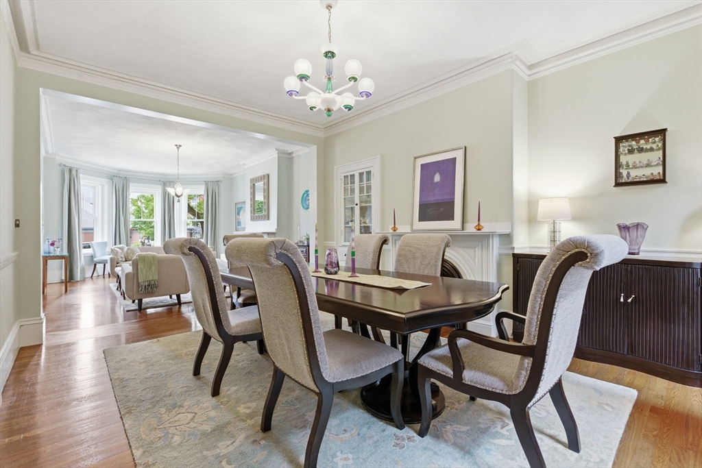 419 Main Street Boston, MA 02129 - Photo 7 of 41 a view of a dining room with furniture and chandelier
