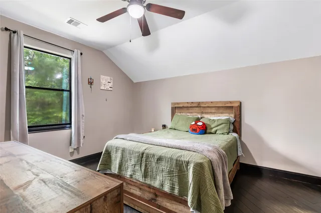 a bathroom with a toilet and a sink