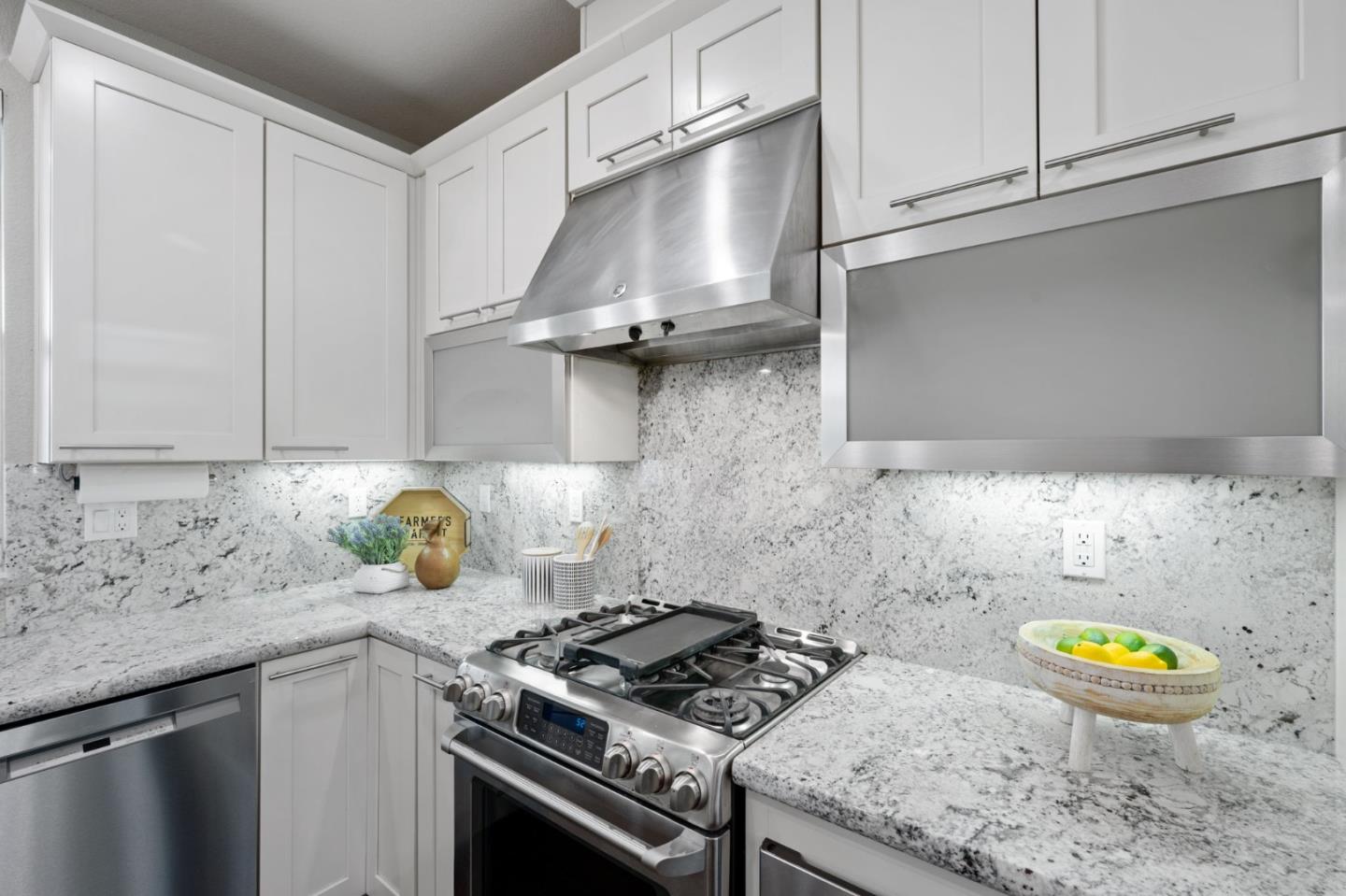 5977 Larkstone Loop San Jose, CA 95123 - Photo 20 of 63 a kitchen with a stove and a sink