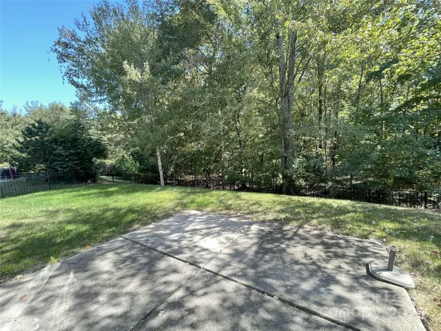 a view of a yard with a trees