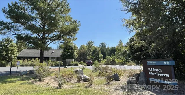 a view of yard with swimming pool