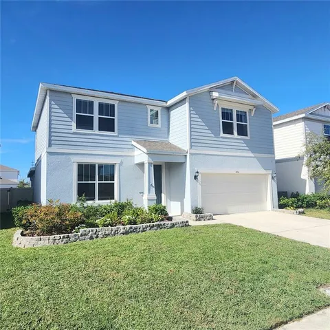 a house view with a garden space