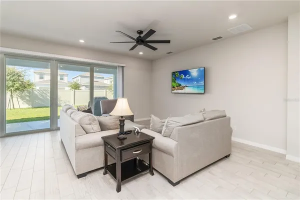 a bedroom with a bed and cabinets