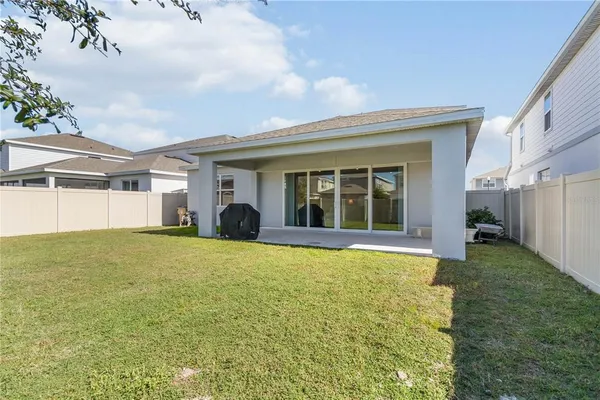a view of outdoor space with swimming pool and patio