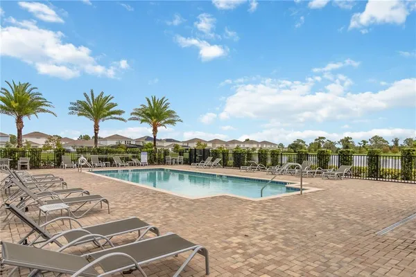 a view of a sign board with a yard