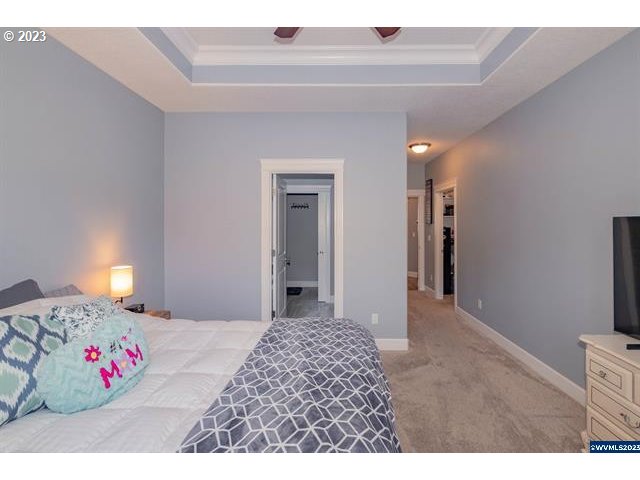 341 Boulder Ridge Drive Sweet Home, OR 97386 - Photo 11 of 32 a bedroom with a bed and a cabinets