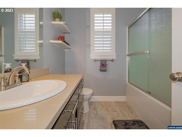 341 Boulder Ridge Drive Sweet Home, OR 97386 - Photo 21 of 32 a bathroom with a sink a toilet and shower