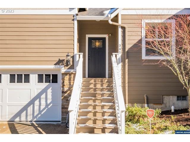 341 Boulder Ridge Drive Sweet Home, OR 97386 - Photo 29 of 32 a front view of a house with large windows