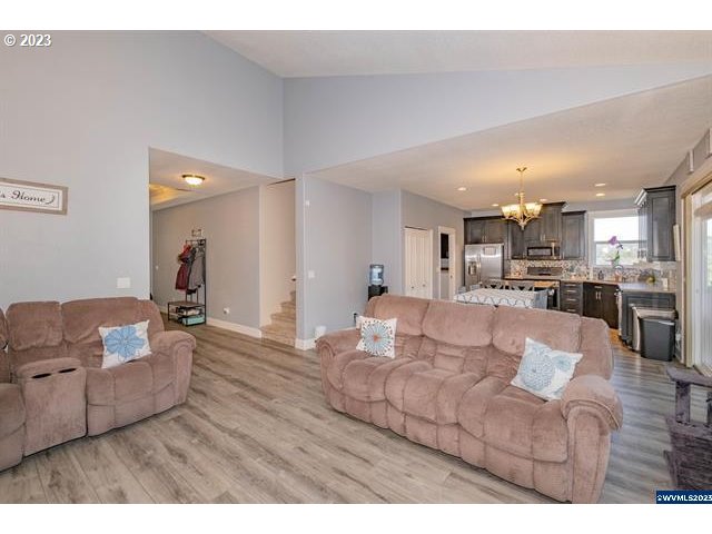 341 Boulder Ridge Drive Sweet Home, OR 97386 - Photo 3 of 32 a living room with furniture and kitchen view