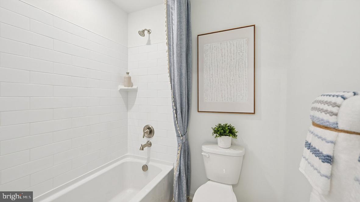 3 Dalton Way Rio Grande, NJ 08242 - Photo 35 of 56 a white bath tub sitting next to a white toilet