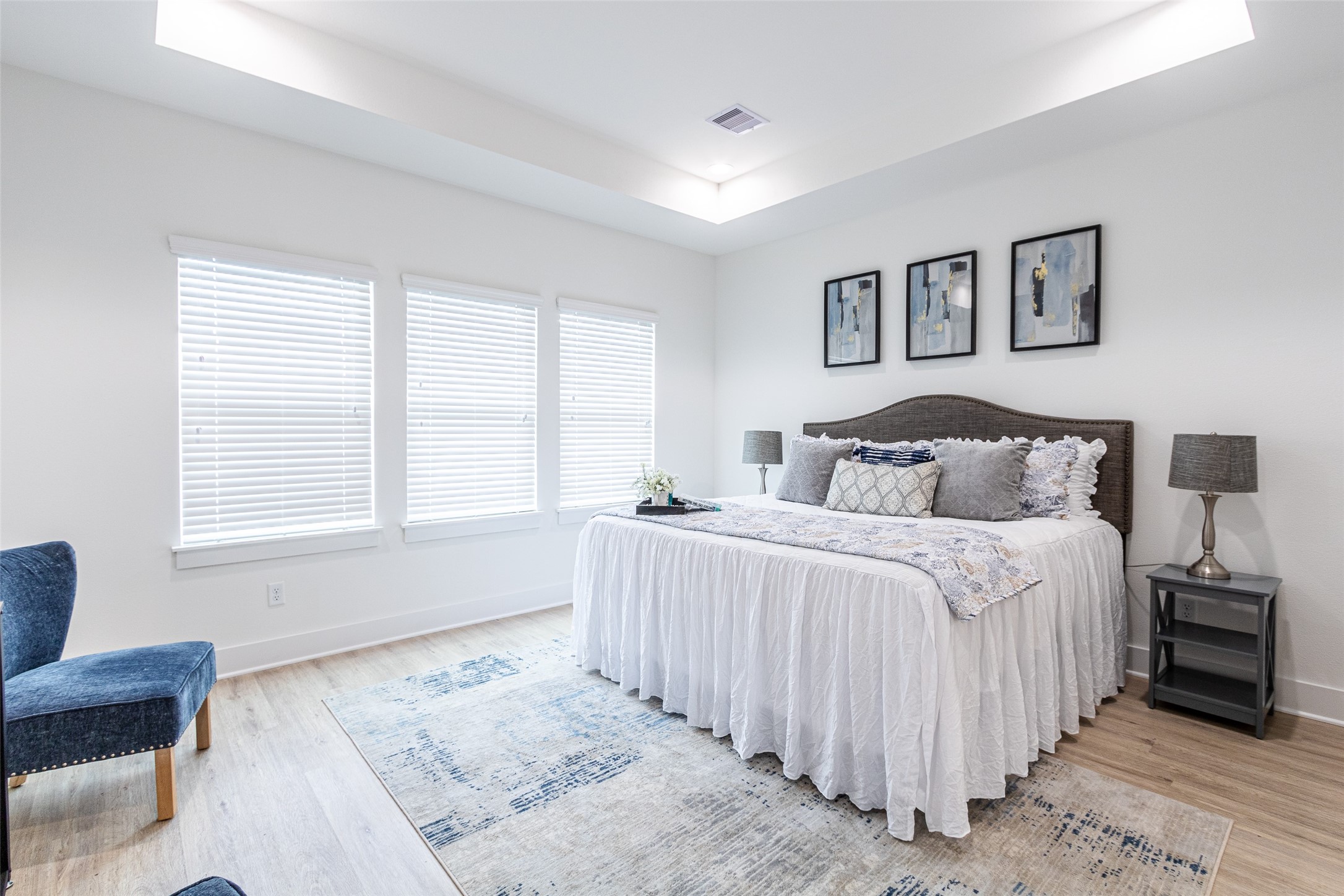 6814 Burkett Street, Unit B Houston, TX 77021 - Photo 15 of 30 a bedroom with a bed and a couch